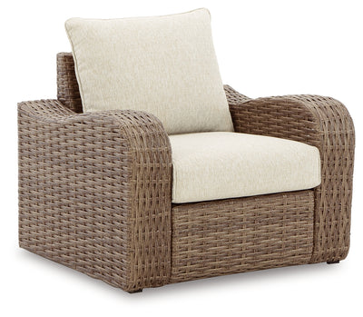 Sandy Bloom Outdoor Ottoman with Cushion