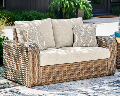 Sandy Bloom Outdoor Ottoman with Cushion