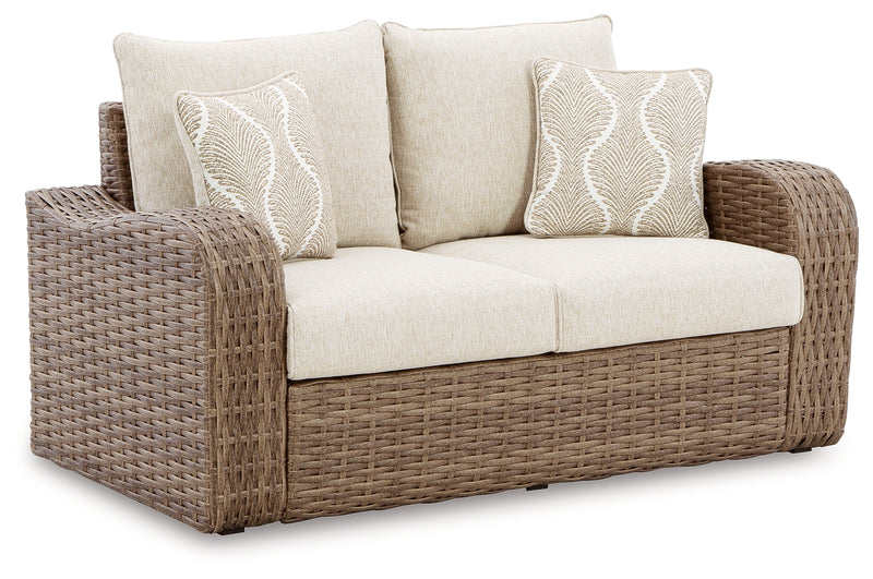 Sandy Bloom Outdoor Ottoman with Cushion