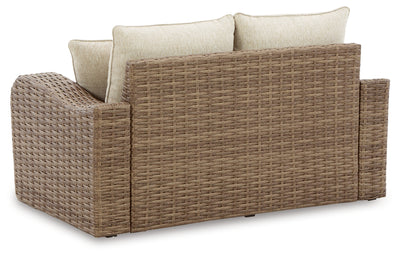 Sandy Bloom Outdoor Ottoman with Cushion